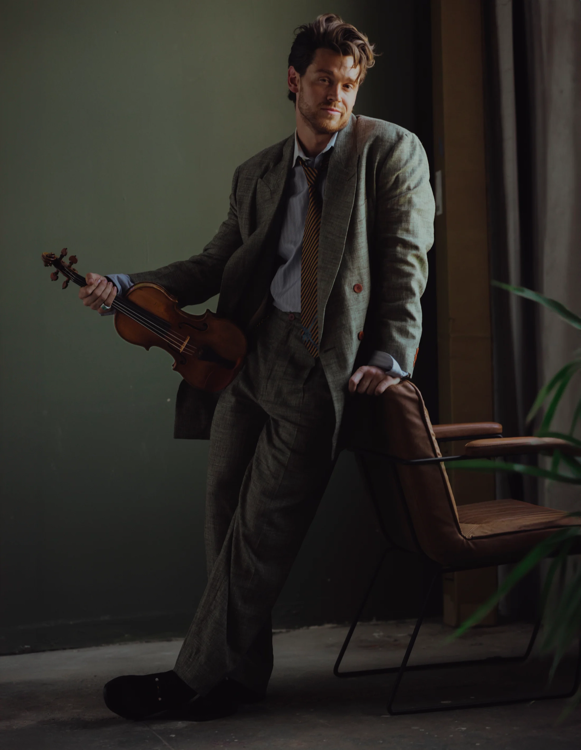 Blake Pouliot performing with his violin